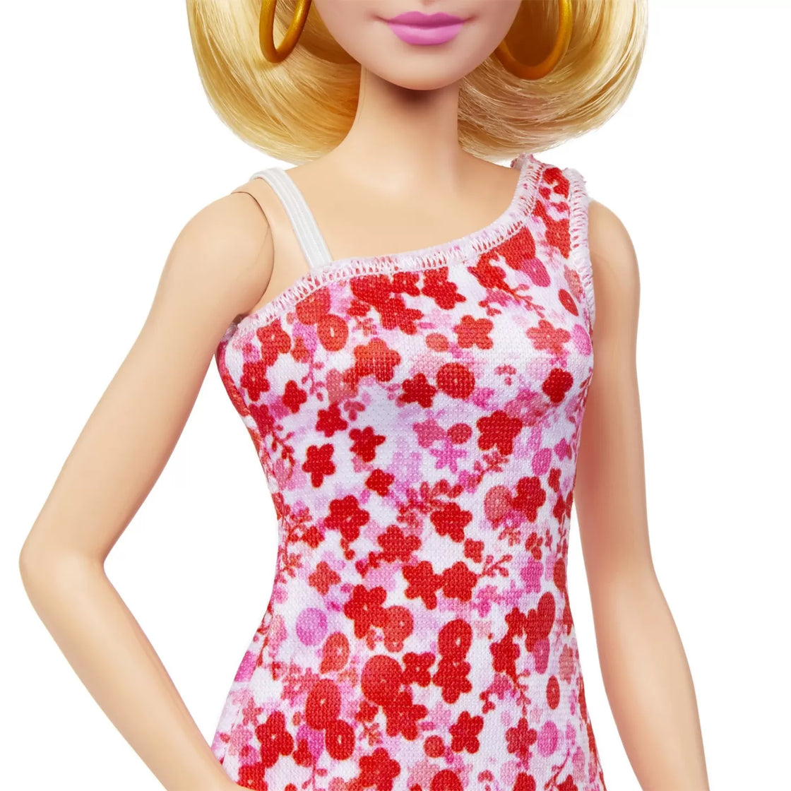 Barbie papusa barbie fashionista blonda cu parul prins in coada si rochie cu floricele