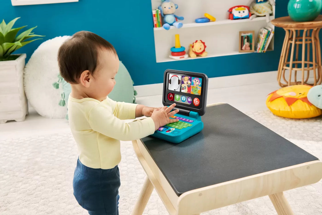 Fisher price laugh&learn laptop interactiv in limba romana