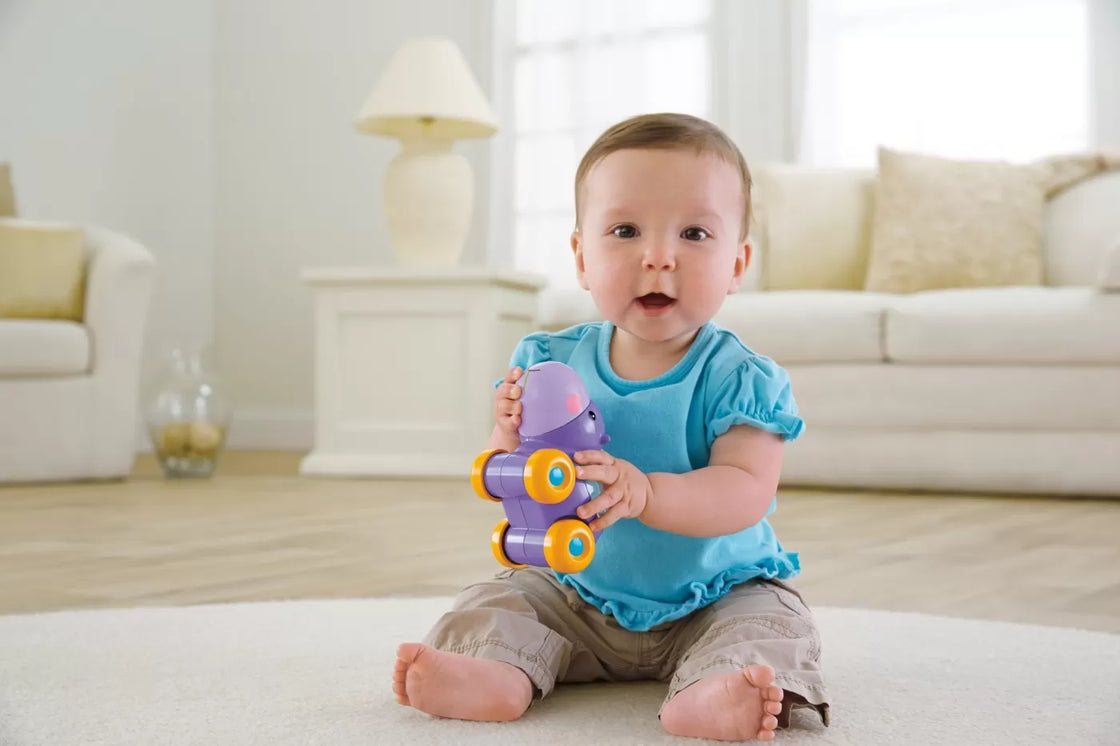 Fisher price jucarie apasa si mergi hipopotam