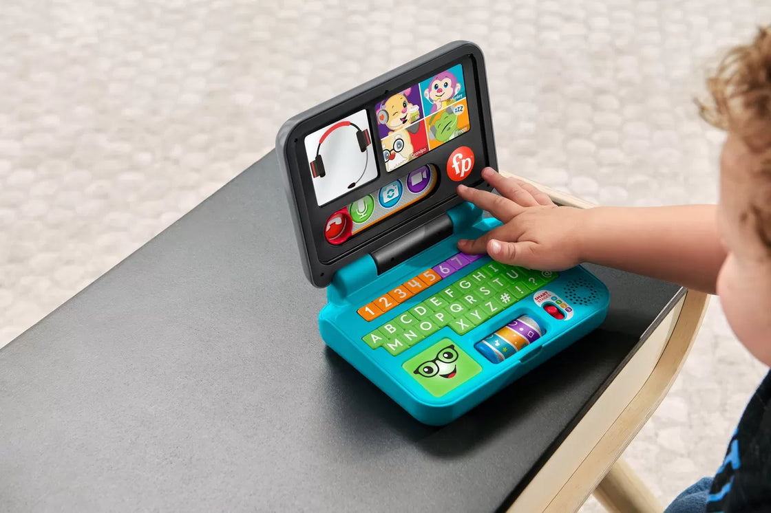Fisher price laugh&learn laptop interactiv in limba romana