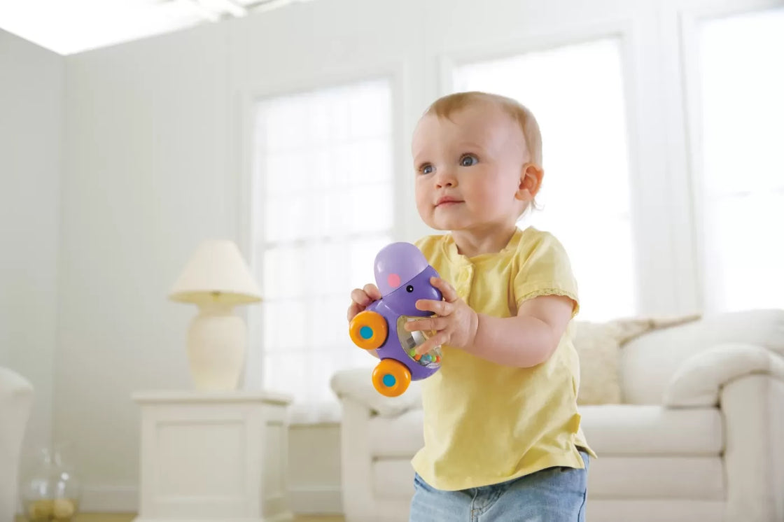 Fisher price jucarie apasa si mergi hipopotam