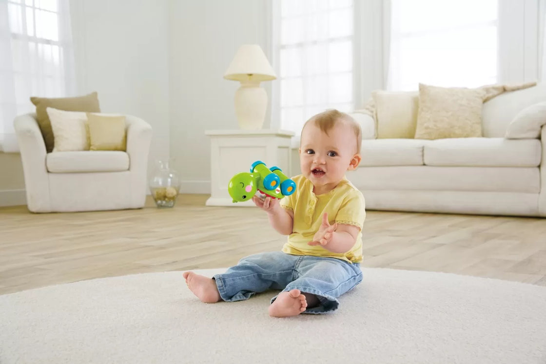 Fisher price jucarie apasa si mergi testoasa