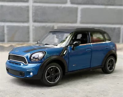 Masinuta metalica minicooper albastru scara 1 la 24